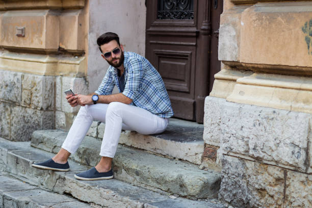 istock Casual Guy With The Phone 1071908120