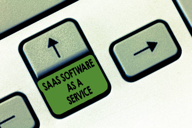 istock Handwriting text writing Saas Software As A Service. Concept meaning the use of cloud based App over the Internet 1071916262