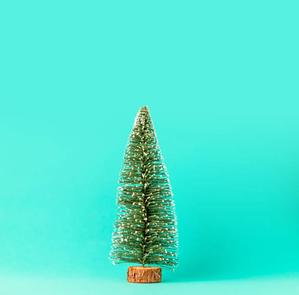 istock toy pine christmas tree on color background with free copy space for your creativity ideas text festive background 1071918560