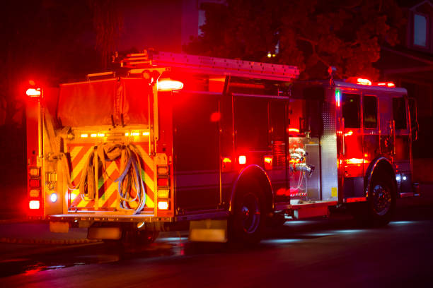 Firetruck Stock Photo - Download Image Now - Firefighter, Fire Engine, Night  - iStock