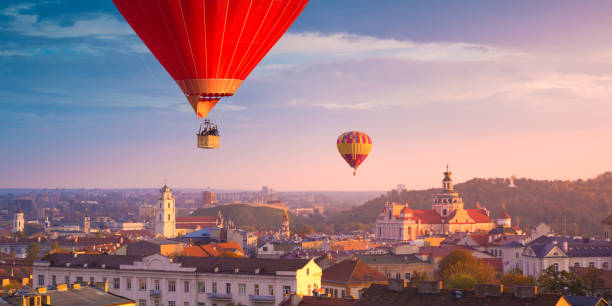 Hot air balloons flying over Vilnius Hot air balloons flying over Vilnius, Lithuania lithuania photos stock pictures, royalty-free photos & images