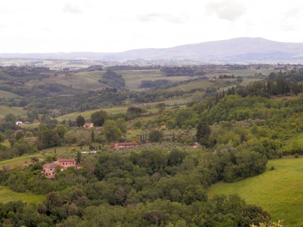 istock Italian countryside with buildings 1071922976