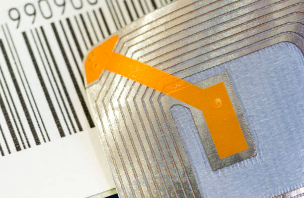istock Close up of RFID tags ana a code bar used for tracking and identification purposes and as an anti-theft system in commerce and retail. 1071924210