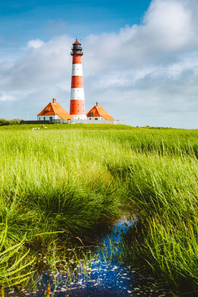 istock Westerheversand lighthouse, North Sea, Schleswig-Holstein, Germany 1071929502
