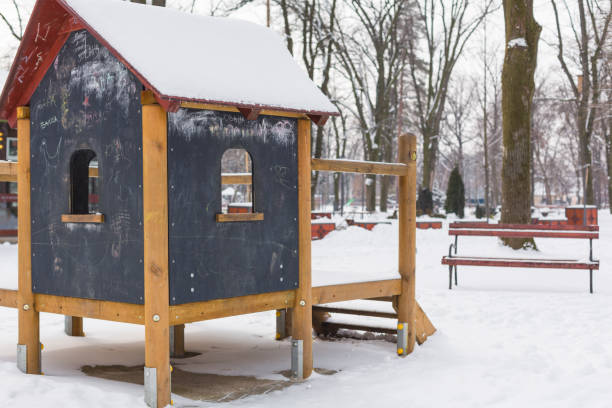 istock Wooden panel playing house in winter 1071931110