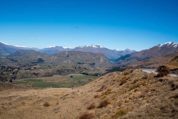 istock snow capped mountain scenery and ski fields of Queenstown 1071934366