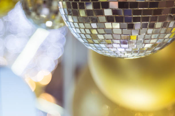 istock Christmas tree decorated with mirror disco ball. Ornament lighting and gliter decor for celebrate, merry christmas and Happy new year. 1071935770
