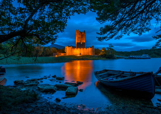 Ross castle and his reflection in Lough  lake. Castle is located near city of Killarney in Ireland.