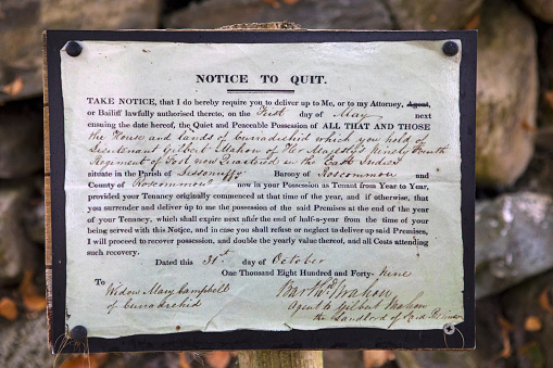 County Kerry, Rep of Ireland - August 17th 2018: An Eviction Notice at the ruins of a cottage desserted during the Irish famine in the 19th century.  Families were evicted from their homes during the famine, unable to pay their rent.