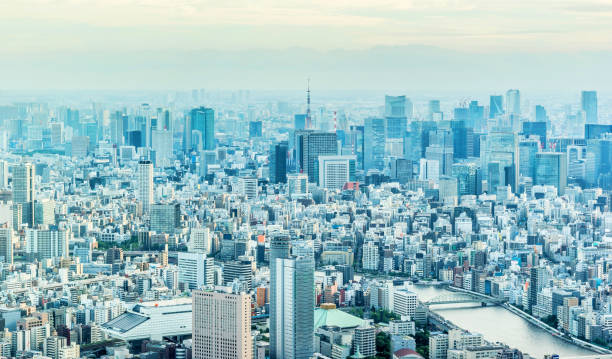 city urban skyline aerial view in koto district, japan Asia Business concept for real estate and corporate construction - panoramic modern city urban skyline bird eye aerial view under sun and blue sky in koto district, Tokyo, Japan sumida ward photos stock pictures, royalty-free photos & images