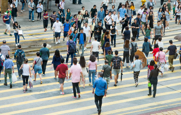 istock People walking on zebra crossing 1071948494