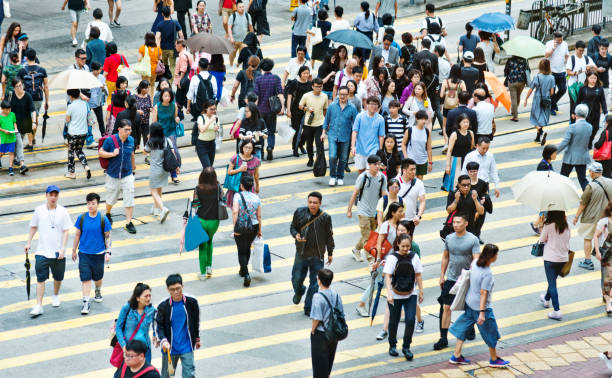 istock People walking on zebra crossing 1071948518