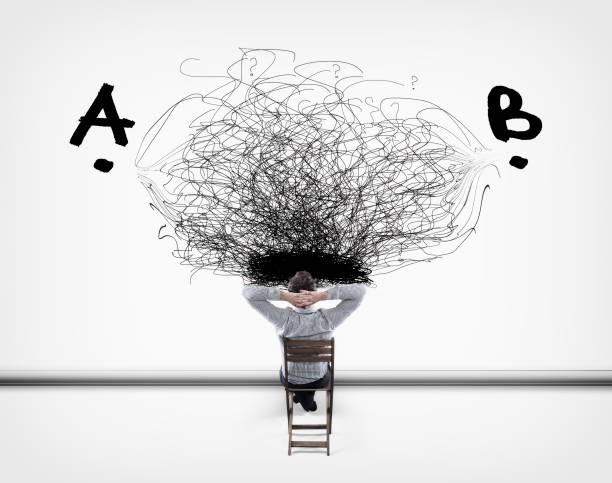 istock Businessman looking at a chaotic path of point a to point b. 1071948636