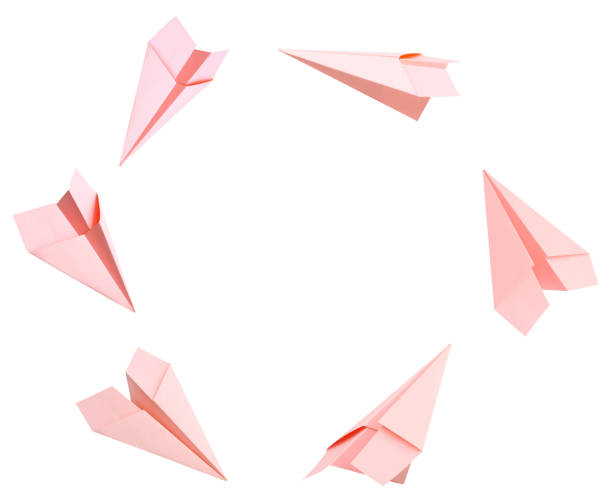 istock A origami plane on departure 1071966304