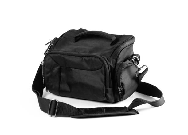 istock Black textile bag for SLR camera. Close up. Isolated on white background. 1071976730