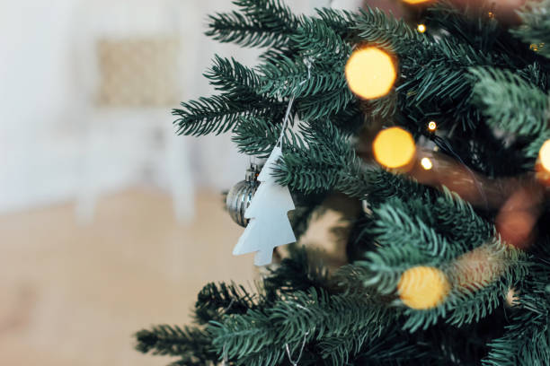 istock Decorated Christmas tree, minimalist Scandinavian decor backgrou 1071977256