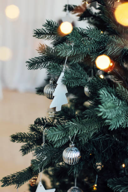 istock Decorated Christmas tree, minimalist Scandinavian decor backgrou 1071977302