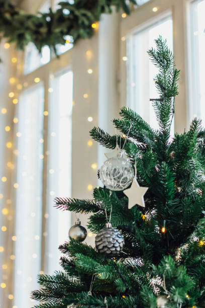istock Decorated Christmas tree background, minimalism Scandinavian int 1071977658