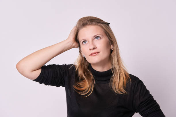 istock Young girl. White background. Blond hair 1071996398