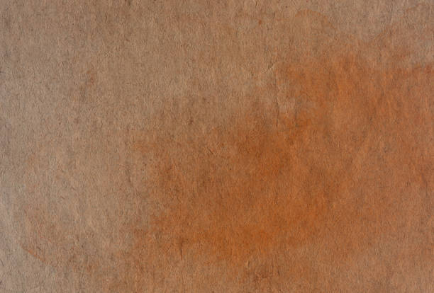 istock vintage paper background 1072001544