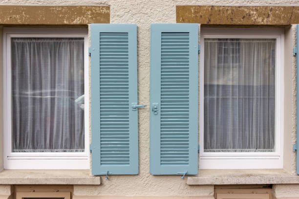 istock historical city facades with doors and windows details 1072004326