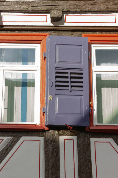 istock historical city facades with doors and windows details 1072004628