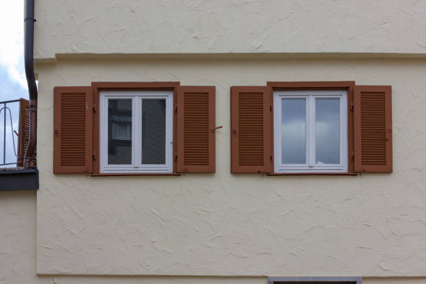 istock historical city facades with doors and windows details 1072004652