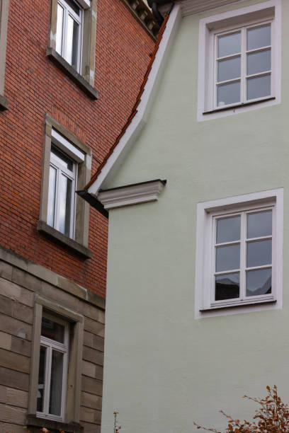istock historical city facades with doors and windows details 1072005088