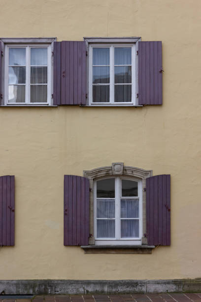 istock historical city facades with doors and windows details 1072007298