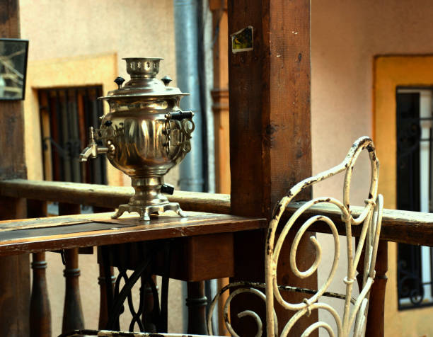 istock Samovar. Tea urn. Metal samovar on wood table. Tea time. 1072007532