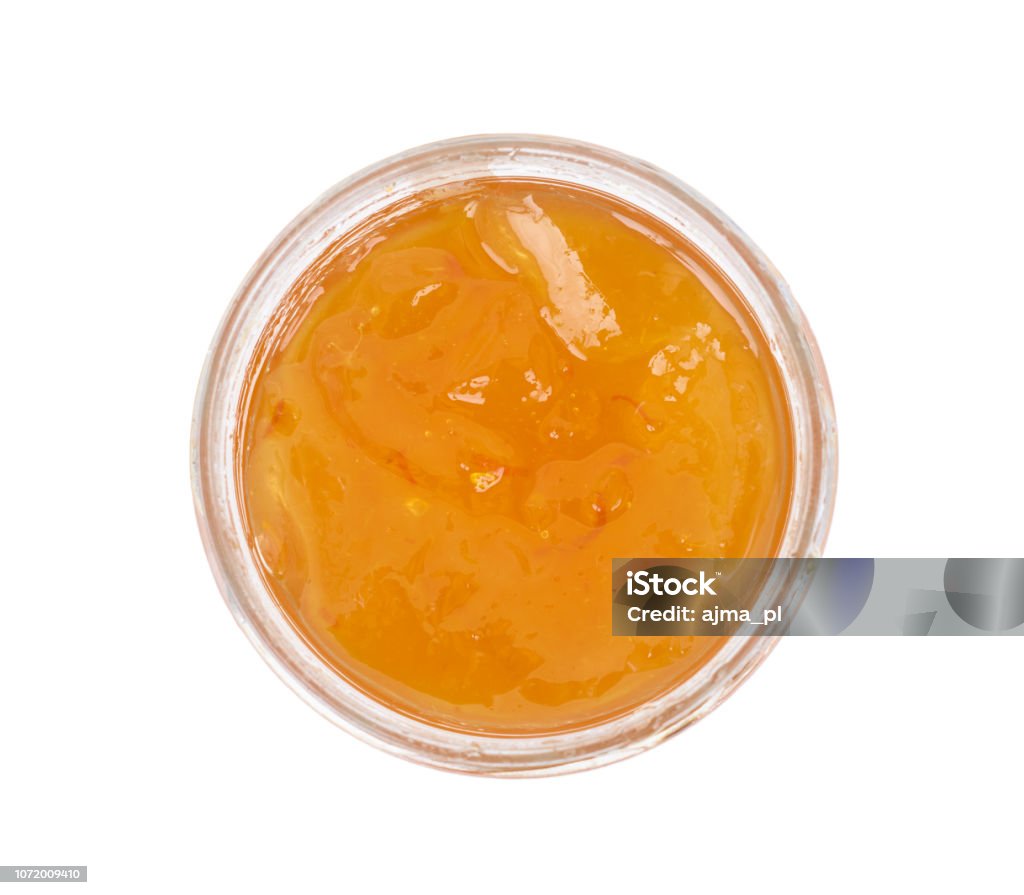 Orange homemade jam isolated on white background. Top view. Preserves Stock Photo
