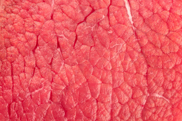 istock An overhead photo of meat texture, raw cut, also called eye round beef 1072025906