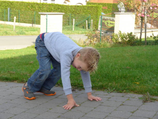 istock Five year old rebel boy playing on the driveway 1072044306