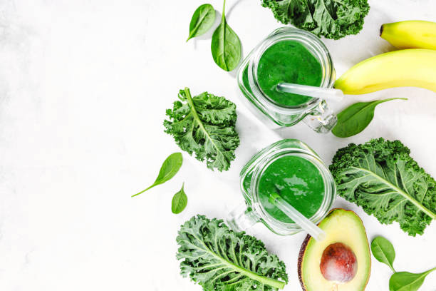 istock Fresh made green smoothie in bottle 1072044322