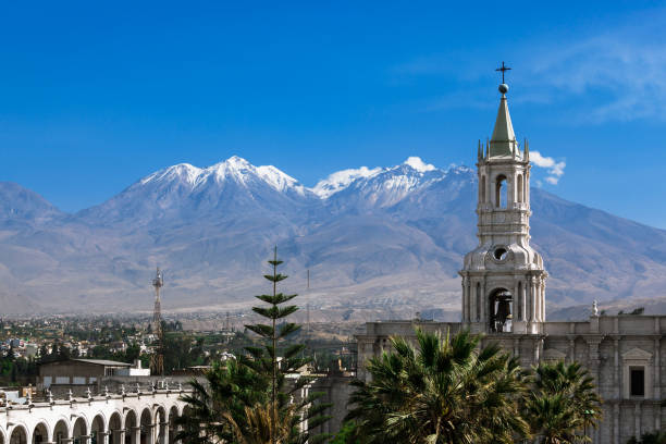 oldest church in background volcano oldest church in the background volcano arequipa province stock pictures, royalty-free photos & images