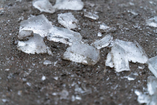 istock pieces of ice on the grey ground as a background 1072053586