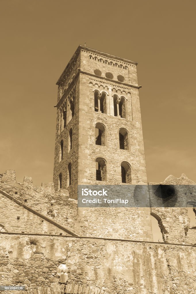 The Romanesque abbey of Sant Pere de Rodes, in the municipality of El Port de la Selva. Girona, Catalonia The Romanesque abbey of Sant Pere de Rodes in Cap de Creus Natural park. It is a former Benedictine monastery in the comarca of Alt Emporda, in the North East of Catalonia, Spain. Cap De Creus Stock Photo