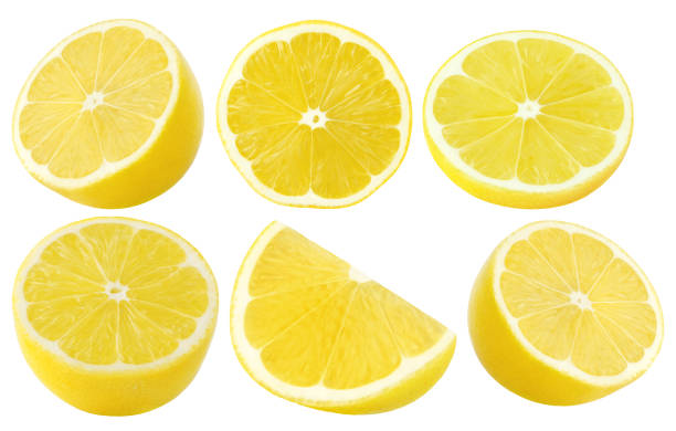 istock Isolated lemons. Whole lemon and slices isolated on white with clipping path 1072054294