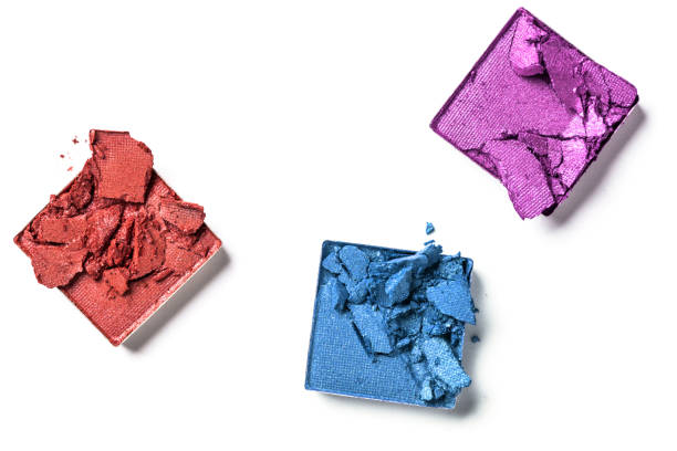 istock Crumbled colourful eyeshadow isolated on white background. Cut out 1072061166