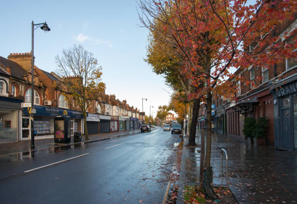 Northfields, London, England - Nov 11, 2018: Quiet Northfields Avenue, the main street of the suburban town on early Sunday morning.