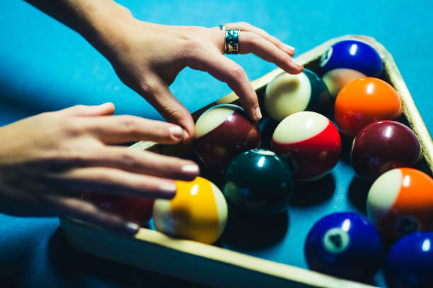 istock Woman preparing table for billiard game. 1072067182