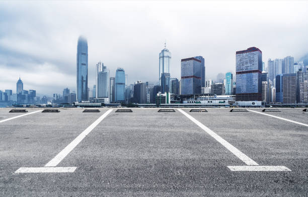 istock Panoramic skyline and buildings with empty road in Hong Kong 1072071924