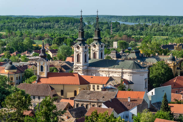 istock Panorama of Sremski Karlovci. Two churches (Orthodox St. Nicholas Cathedral and Roman Catholic Church Holy Trinity) 1072074352