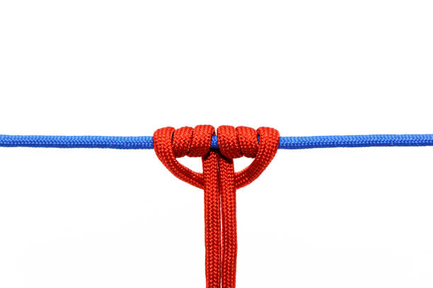 istock Knot on a cord on a white background . 1072084226