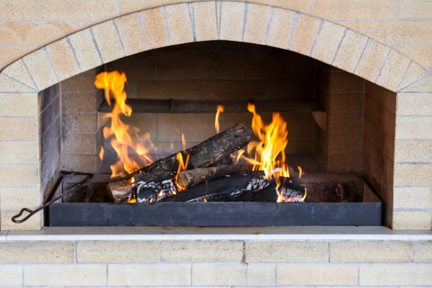 istock Burning firewood in the oven made under the fireplace 1072087918
