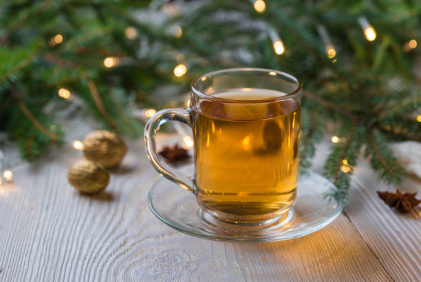 istock Tea cup, Christmas or new year decoration on modern wooden table. 1072089700