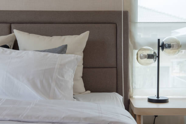 istock white pillows on bed in modern bedroom 1072092874