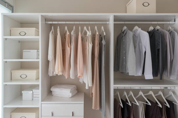 istock modern closet with clothes hanging 1072092888