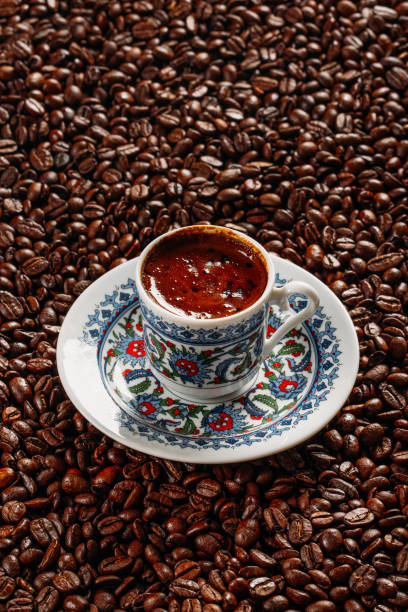 istock Turkish Coffee on Coffee Beans Background 1072093118