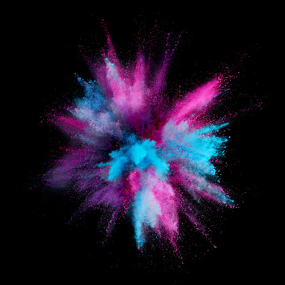 Colored powder explosion. Abstract closeup dust on backdrop. Colorful explode. Paint holi